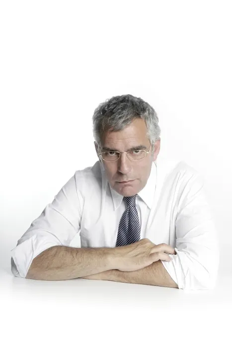 Framed Print : Businessman senior glasses relaxed portrait white desk background