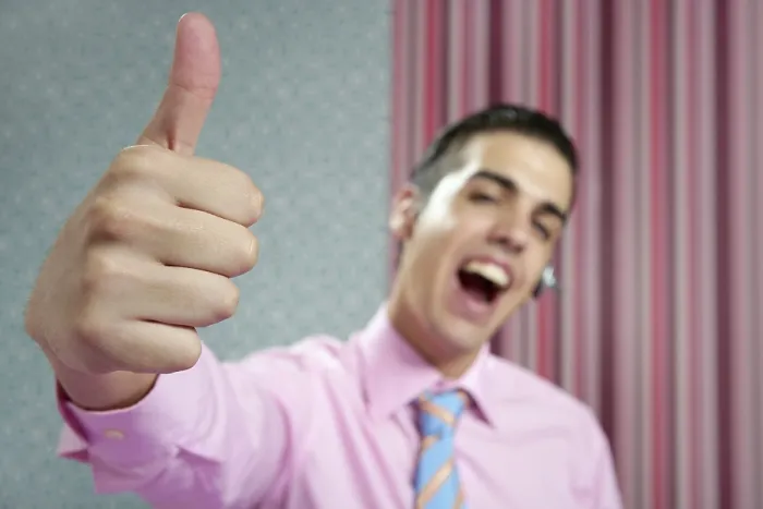 Framed Print : Businessman young with okay sign in his hand over wallpaper background