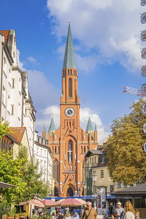 Framed Print : A busy urban centre is dominated by a tall church tower