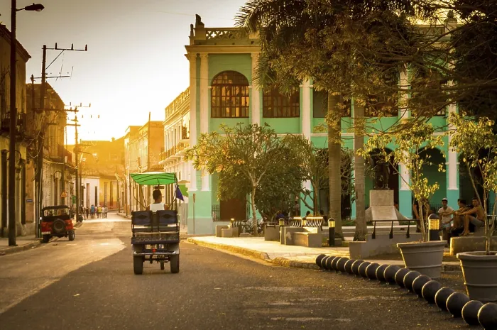 Framed Print : Camaguey, Cuba on January 3, 2016: Cuba in the most beautiful golden hour light