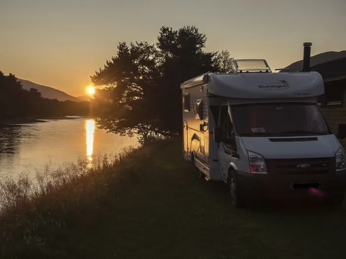 Framed Print : Camper van parked for the night at river bank of river Lagen Framed Print : Camper van parked for the night at river bank of river Lagen