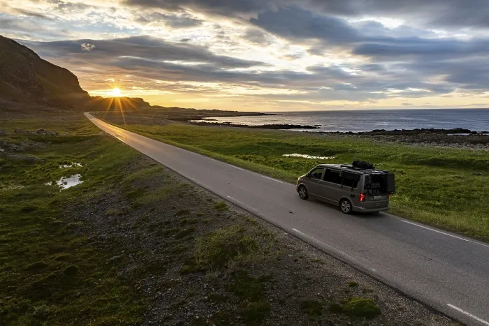 Framed Print : Camper van travelling along the road to Berlevag