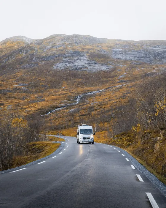 Framed Print : Campervan on a road with autumnal vegetation Framed Print : Campervan on a road with autumnal vegetation