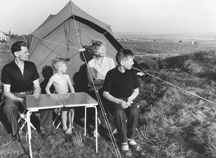 Framed Print : Camping in the 1960s. A family outside their tent Framed Print : Camping in the 1960s. A family outside their tent