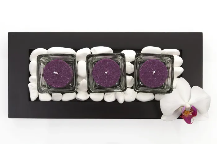 Framed Print : Candles with white stones and orchid blossom zen like spa background Framed Print : Candles with white stones and orchid blossom zen like spa background