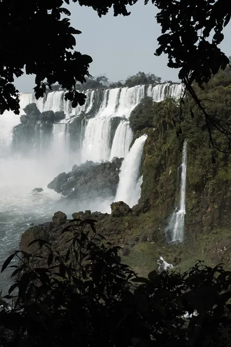 Framed Print : Captivating photo of Iguazu Falls framed by dark foliage