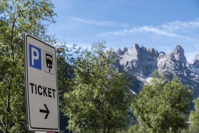Framed Print : Car park sign in front of a mountain backdrop in the Dolomites