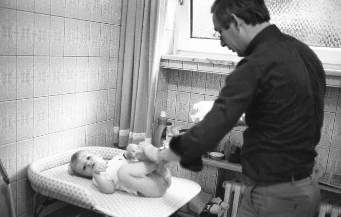 Framed Print : The care of a small child by the father was rather rare in 1980