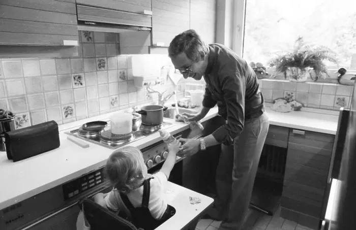 Framed Print : The care of a small child by the father was rather rare in 1980