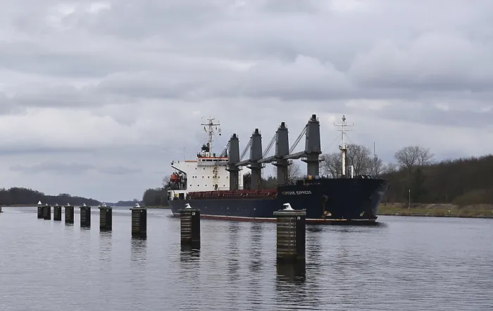 Framed Print : Cargo ship FORTUNE EXPRESS in the Kiel Canal
