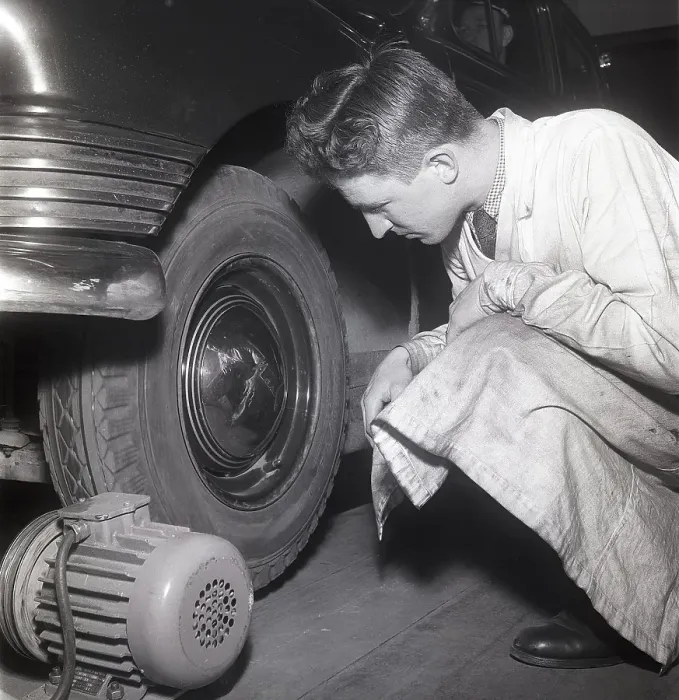 Framed Print : Cars in the 1950s. At this time the yearly mandatory checkup and control of cars was not in affect. Picture taken at the garage of the Swedish Royal Automobile club where a car is controlled that everything is in working order. Sweden 1951