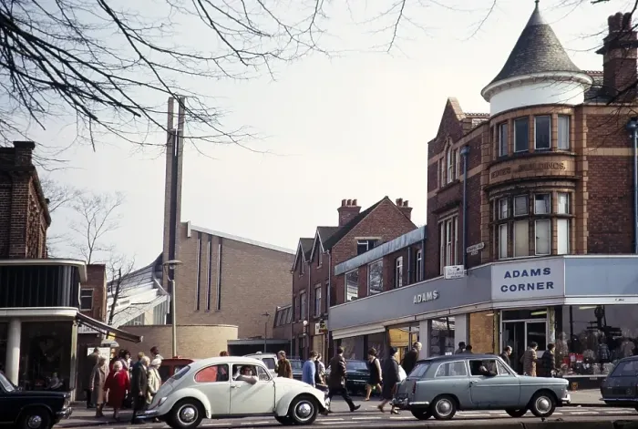 Framed Print : Cars, including VW Volkswagen Bettle, and shoppers at Adams Corner and the modern church of St Dunstans, Kings Heath, Birmingham, West Midlands, England, UK 1972