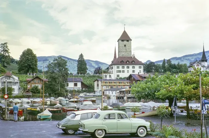 Framed Print : Cars parked next to boats, Spiez Castle on Lake Thun, Thun, Bernese Oberland region, Switzerland, Europe 1963, Europe