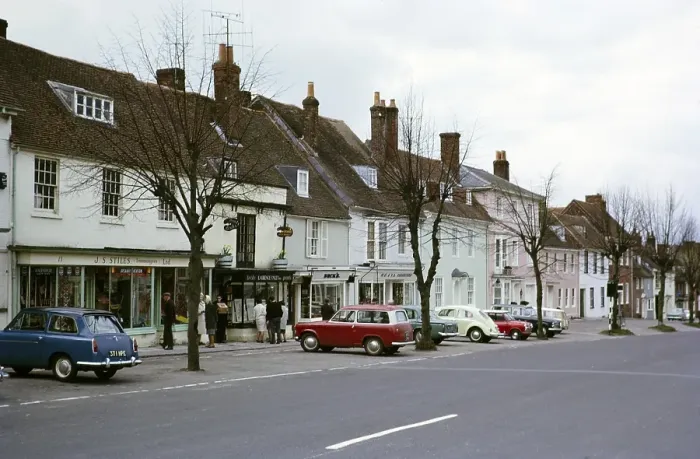 Framed Print : Cars parked in front of shops in New Alresford, Hampshire, England, 1966 Framed Print : Cars parked in front of shops in New Alresford, Hampshire, England, 1966