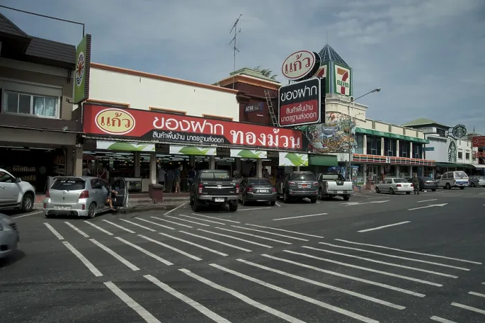 Framed Print : Cars parking outside restaurant