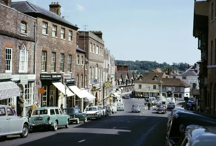 Framed Print : Cars and shops in Arundel town centre, West Sussex, England.1965 Framed Print : Cars and shops in Arundel town centre, West Sussex, England.1965