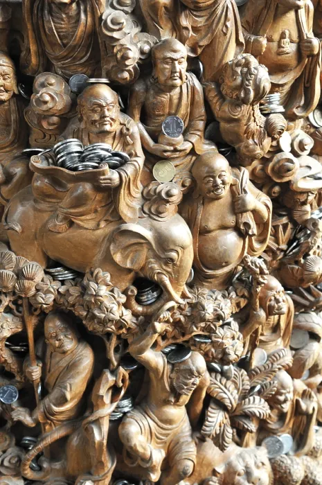 Framed Print : Carved Buddha sculptures with donated money Framed Print : Carved Buddha sculptures with donated money