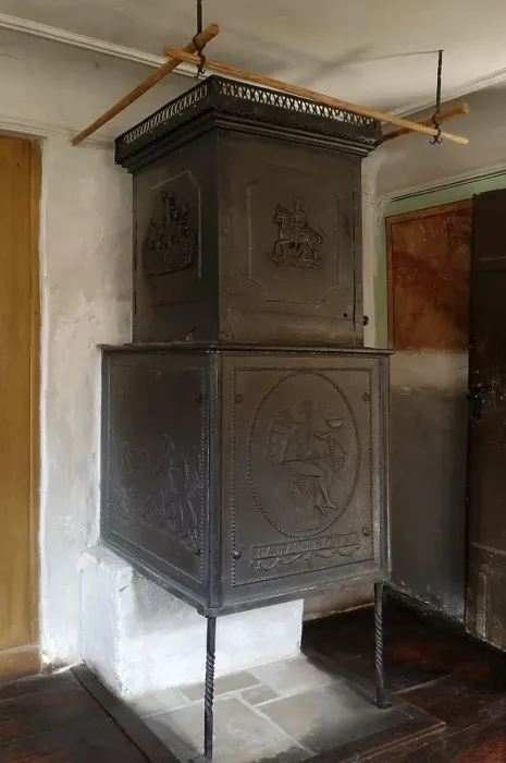 Framed Print : Cast-iron stove from around 1830 in the parlour of the Haeckerhaus
