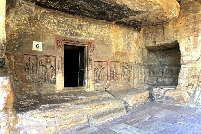 Framed Print : Cave cut into sandstone hill 5 kms from vidish gupta shrines no 6 showing different gods on walls outside door frame