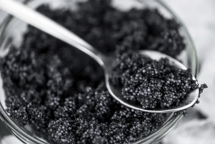 Framed Print : Caviar on a vintage looking slate slab (selective focus)