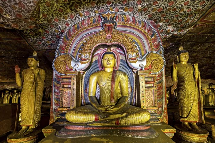 Framed Print : Central Buddha in a richly decorated frame within a cave decorated with ornaments Framed Print : Central Buddha in a richly decorated frame within a cave decorated with ornaments