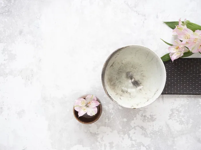 Framed Print : Empty ceramic bowl, pink alstroemeria flowers