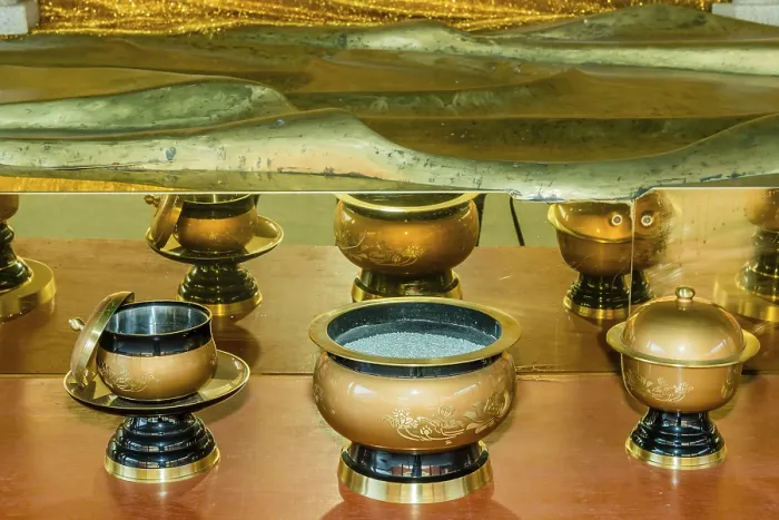 Framed Print : Ceremonial incense bowls in front of mirror under reclining Buddha statue at Manbolsa Temple in Yeongcheon Framed Print : Ceremonial incense bowls in front of mirror under reclining Buddha statue at Manbolsa Temple in Yeongcheon