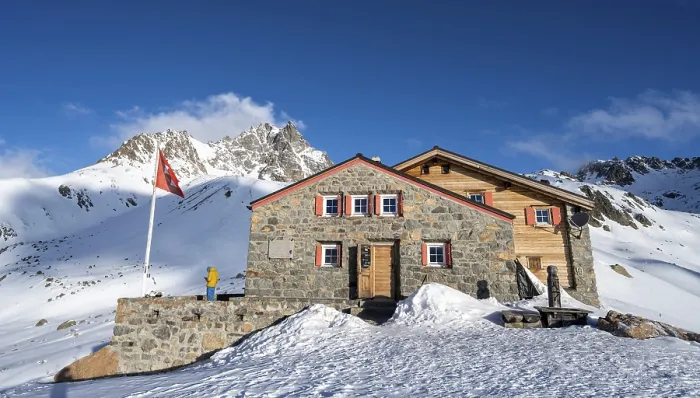 Framed Print : Chamanna d'Es-cha mountain hut in a wintry mountain landscape Framed Print : Chamanna d'Es-cha mountain hut in a wintry mountain landscape