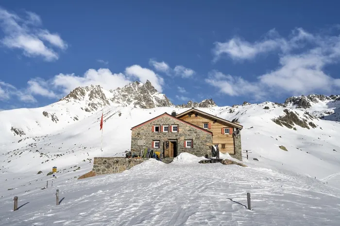 Framed Print : Chamanna d'Es-cha mountain hut in a wintry mountain landscape Framed Print : Chamanna d'Es-cha mountain hut in a wintry mountain landscape
