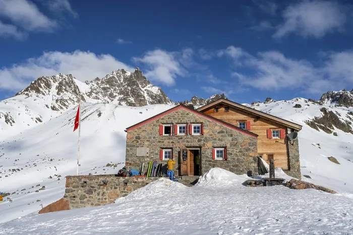 Framed Print : Chamanna d'Es-cha mountain hut in a wintry mountain landscape Framed Print : Chamanna d'Es-cha mountain hut in a wintry mountain landscape