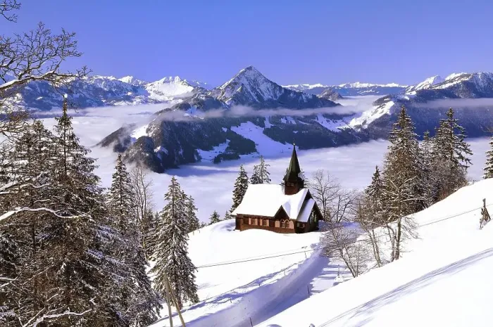 Framed Print : Chapel in winter with view on the Hochflue and the Central Swiss Alps Framed Print : Chapel in winter with view on the Hochflue and the Central Swiss Alps