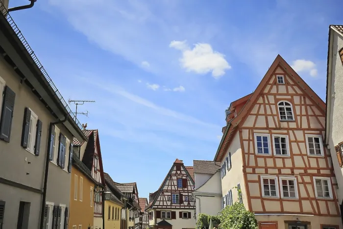 Framed Print : Charming half-timbered houses in a quiet street Framed Print : Charming half-timbered houses in a quiet street