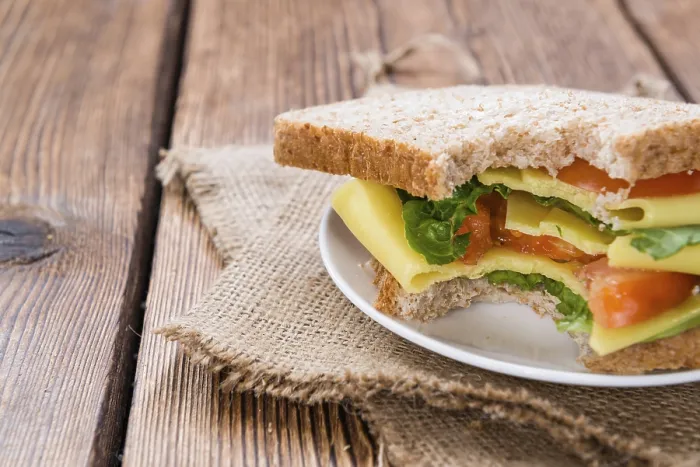 Framed Print : Cheese Sandwich (close-up shot) on vintage wooden background