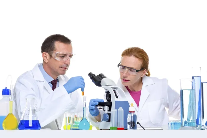Framed Print : Chemical laboratory with two scientist working with test tubes and microscope Framed Print : Chemical laboratory with two scientist working with test tubes and microscope