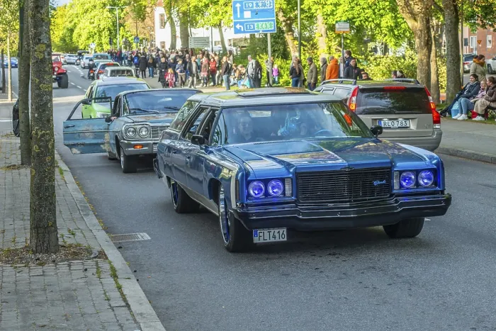 Framed Print : Chevrolet Impala 1975 in cruising with 100s of older American cars on the streets of Ystad