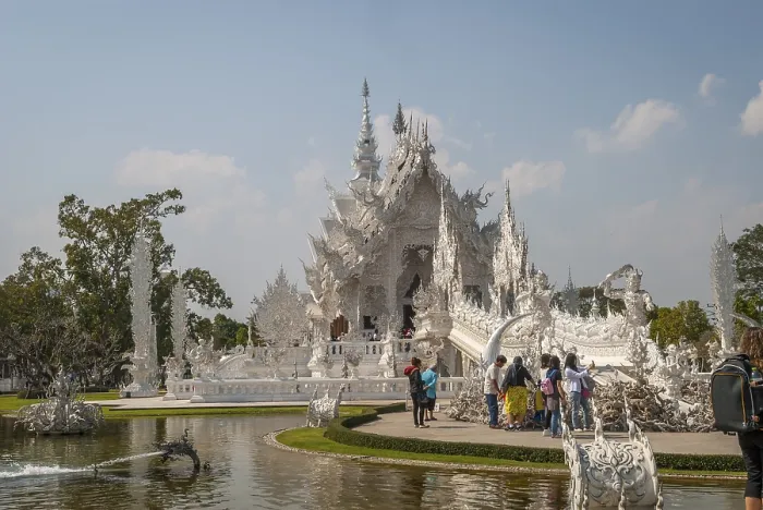 Framed Print : Chiang Rai, Thailand - Feb 2016: Tourists visiting famous Chiang Rai White Temple - Wat Rong Khun on a sunny day