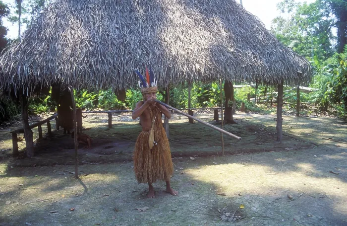 Framed Print : Chief of a Yagua tribe near Iquitos on the Amazon presents blowpipe