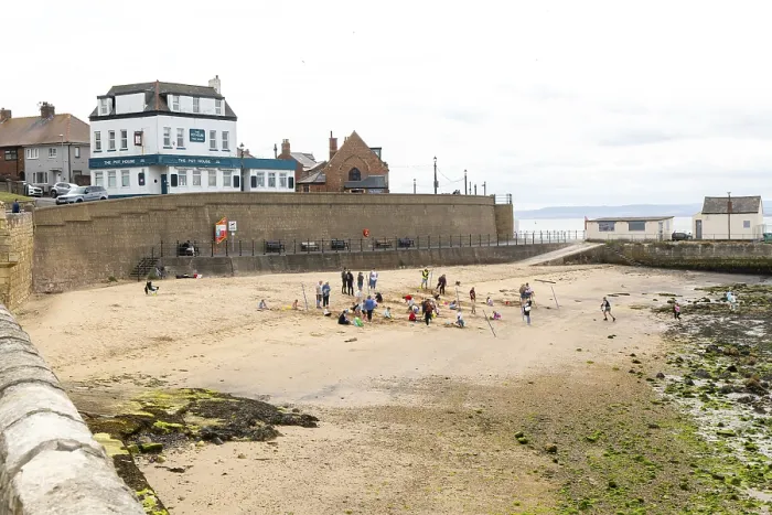 Framed Print : Children enjoying summer holiday activities on sandy beach