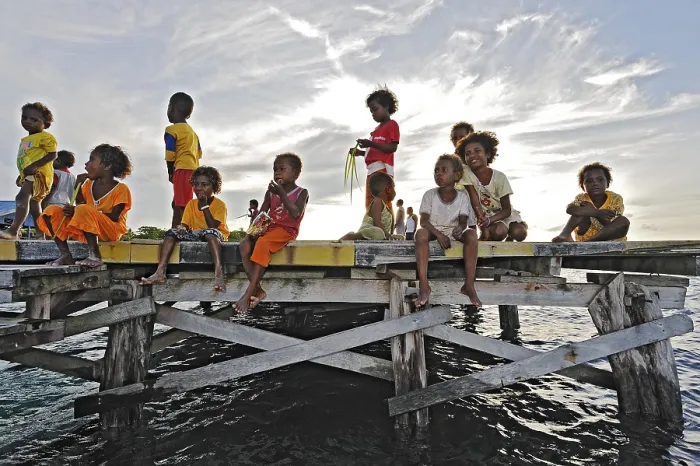 Framed Print : Children on a jetty, Arborek, Raja Ampat