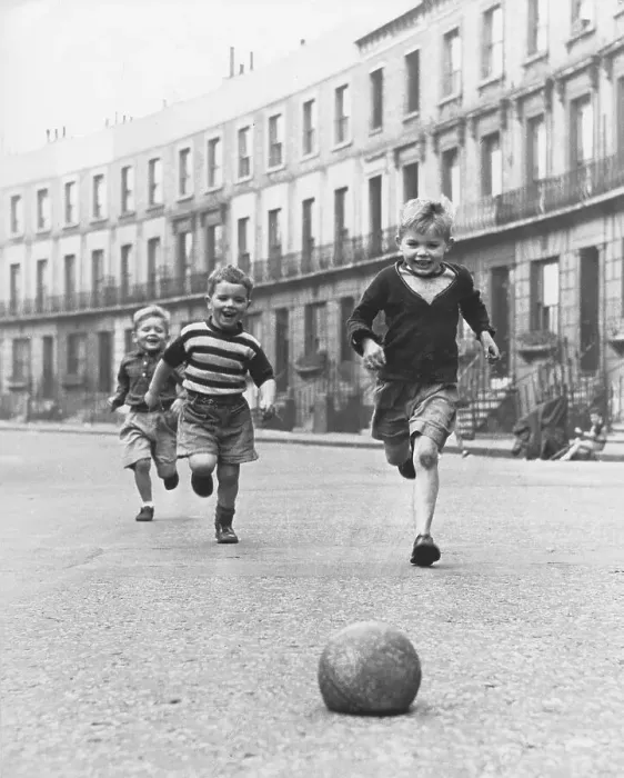 Framed Print : Children play football on the street Framed Print : Children play football on the street