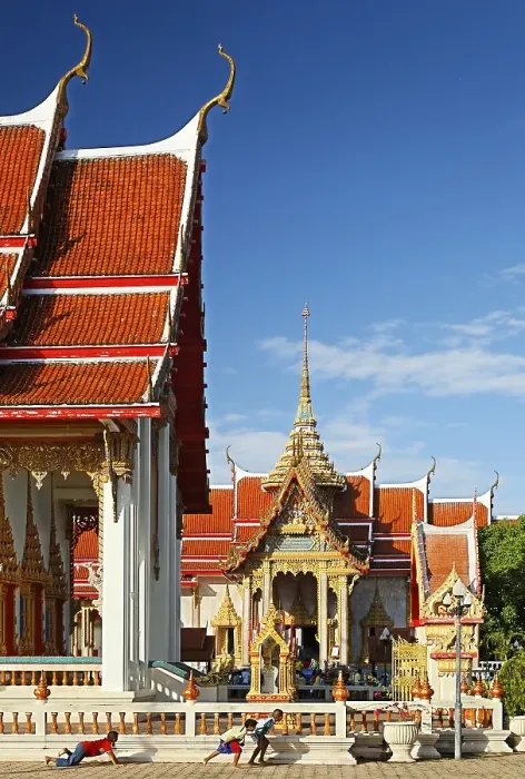 Framed Print : Children playing in front of Wat Chalong temple