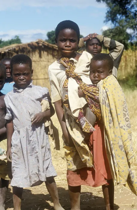 Framed Print : Children posing for the camera on the side of the road
