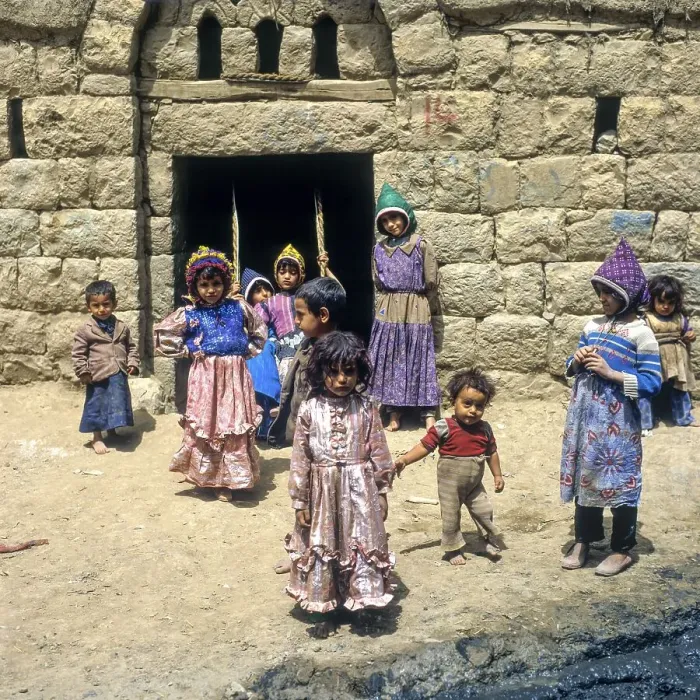 Framed Print : Children rocking in a house entrance, Amran, Yemen, Asia