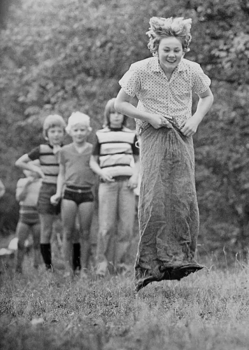 Framed Print : Children in a sack race, East Germany, around 1976 Framed Print : Children in a sack race, East Germany, around 1976