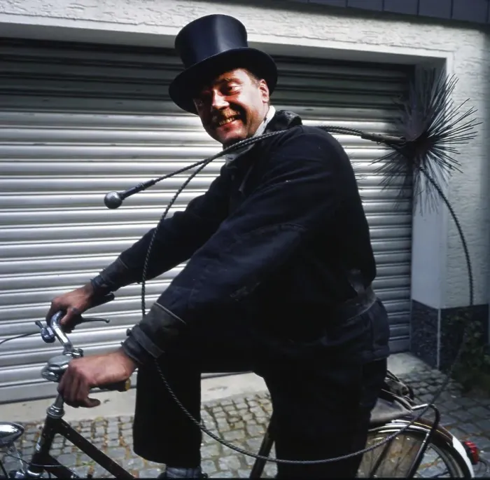 Framed Print : Chimney sweep in professional training and posing in a photo studio