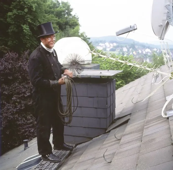 Framed Print : Chimney sweep in professional training and posing in a photo studio