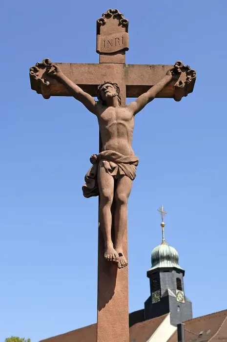 Framed Print : Christ Cross against blue sky at the back of St Framed Print : Christ Cross against blue sky at the back of St
