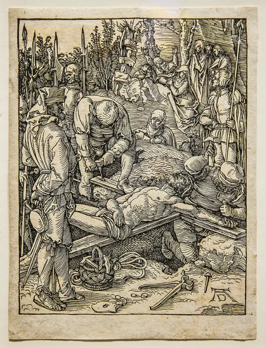Framed Print : Christ being nailed to the cross