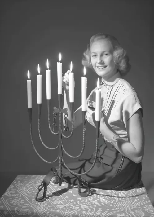 Framed Print : Christmas in the 1950s. Margit Sjoedin is lighting the candles at christmas Framed Print : Christmas in the 1950s. Margit Sjoedin is lighting the candles at christmas
