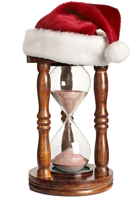 Framed Print : Christmas is coming concept, hourglass with Santa Claus hat isolated on white background